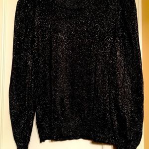 Sparkly black Liz Claiborne sweater with slightly puffy shoulders.